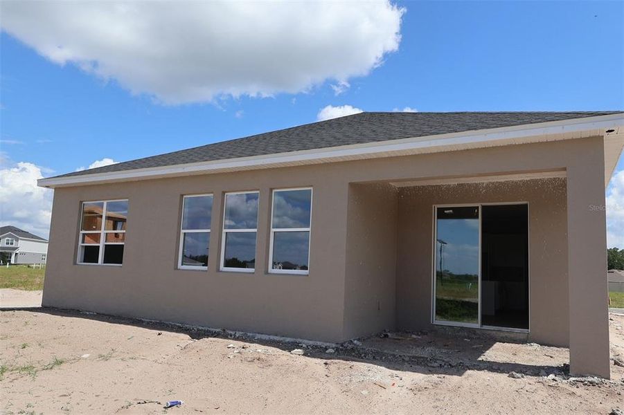 Exterior details and patio area of a home in Bay Lake Farms, St. Cloud (Image 21).