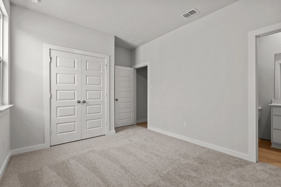 A room with white doors.