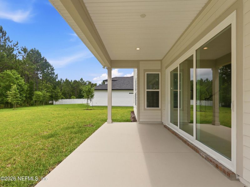 Exterior details and patio area of a home in Silver Landing At Silverleaf, St. Augustine (Image 29).