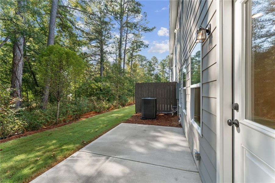 Exterior details and patio area of a home in River Walk Place, Lawrenceville (Image 2).