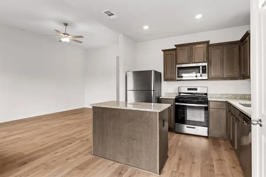 Furnished interior view inside a new home in Patriot Estates, Venus (Image 9).