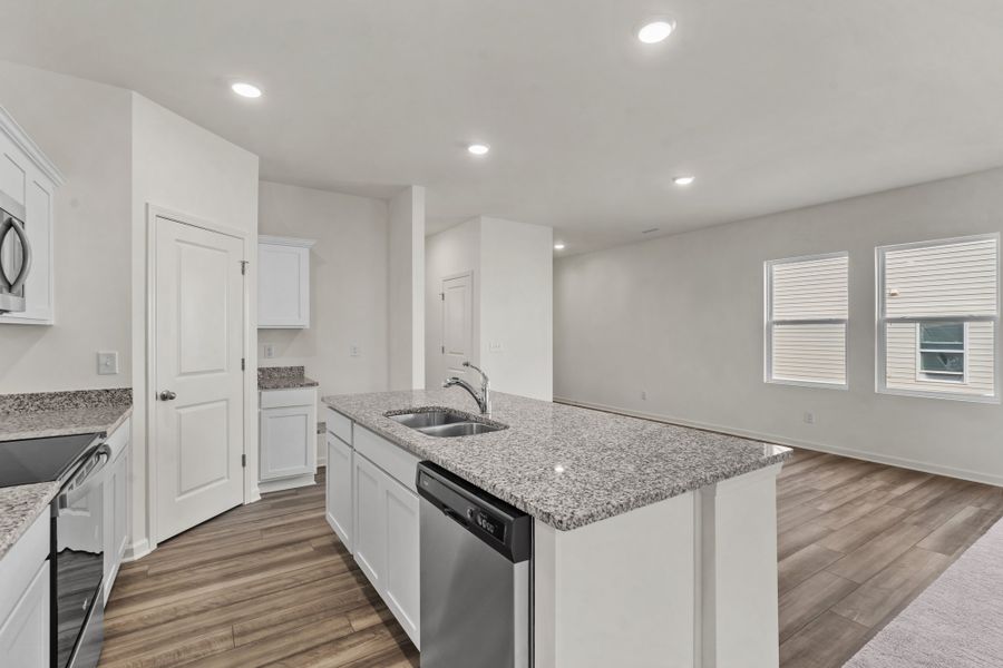 Representative furnished interior of a home built from the Glimmer by Starlight Homes in The Wilder, Adkins (Image 6). Representative furnished interior of a home built from the Glimmer by Starlight Homes in The Wilder, Adkins (Image 6).