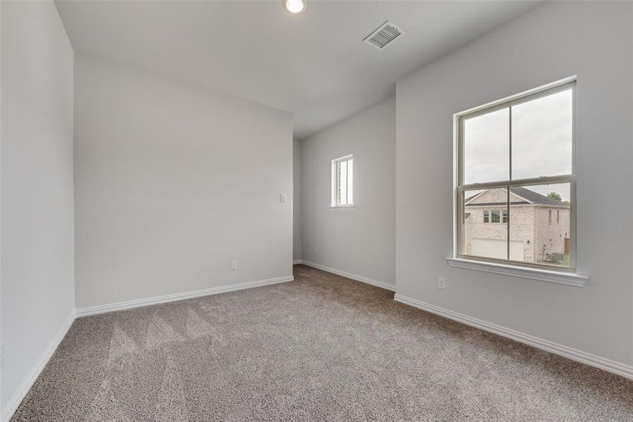 Spacious, unfurnished interior of a new home in Spiritas Ranch, Little Elm (Image 29).