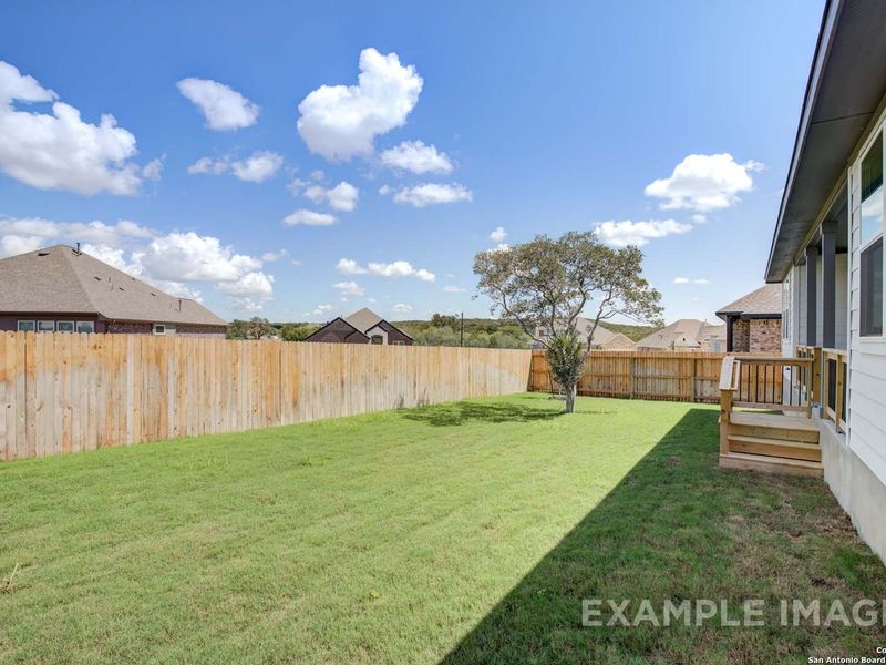 Exterior details and patio area of a home in Ladera, San Antonio (Image 19).