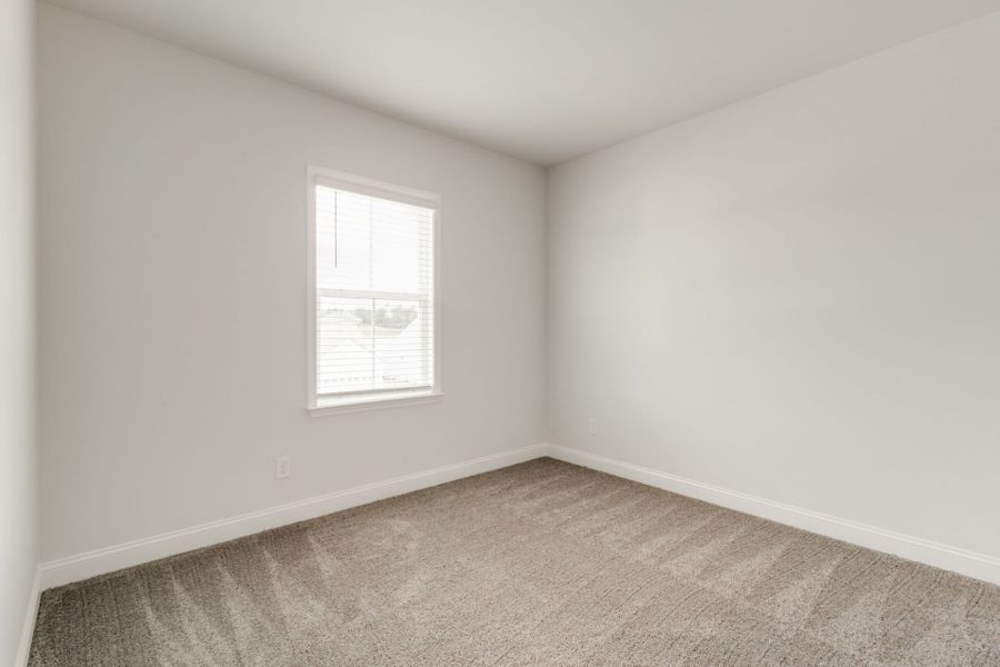 Spacious, unfurnished interior of a new home in Pecan Orchard, Elgin (Image 44).