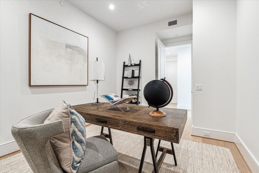 Alternate view of the home office. Photos are of a similar unit with the same floor plan