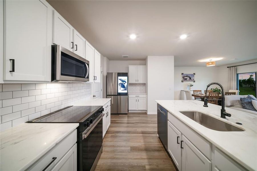 Furnished interior view inside a new home in Star Farms at Lakewood Ranch, Bradenton (Image 4).