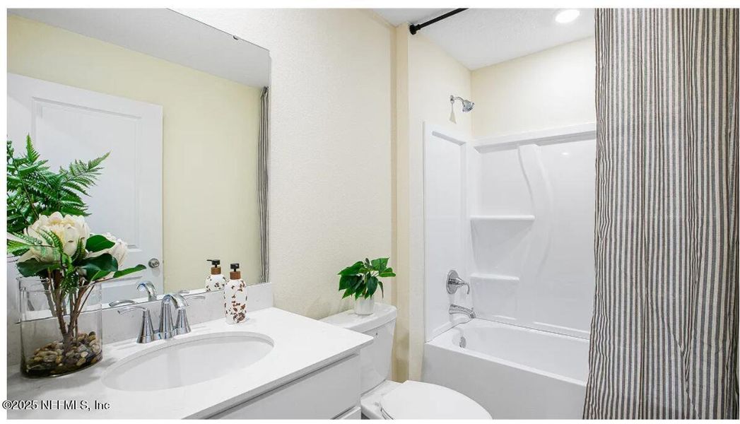 Furnished interior view inside a new home in Holstein Crossing, Green Cove Springs (Image 7).