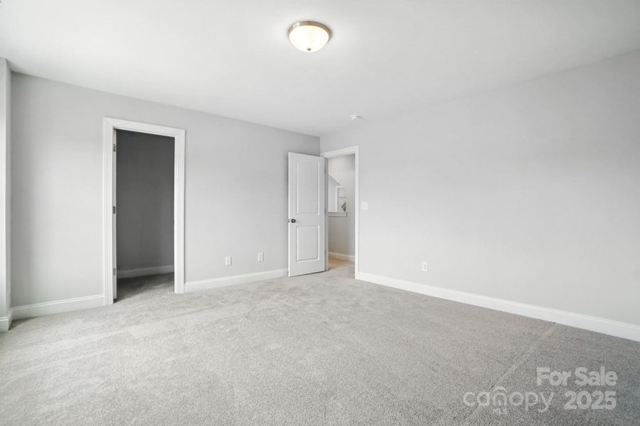 Spacious, unfurnished interior of a new home in Hampton Woods, Charlotte (Image 21).