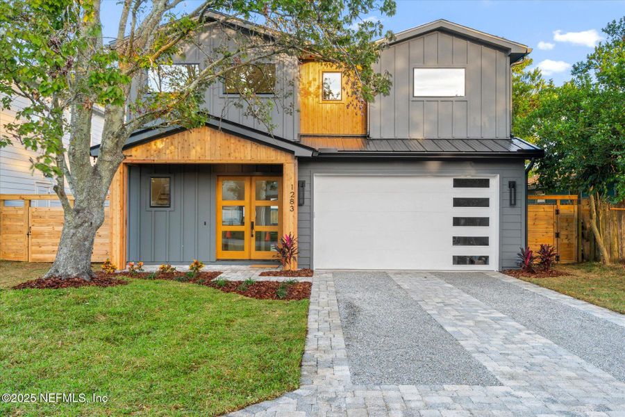 Front exterior of a new home in , Jacksonville Beach, FL, highlighting curb appeal (Image 1). Front exterior of a new home in , Jacksonville Beach, FL, highlighting curb appeal (Image 1).