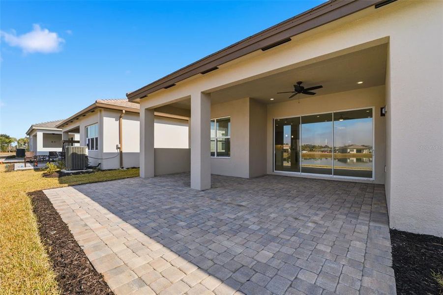 Exterior details and patio area of a home in Valencia Ridge, Wesley Chapel (Image 4).
