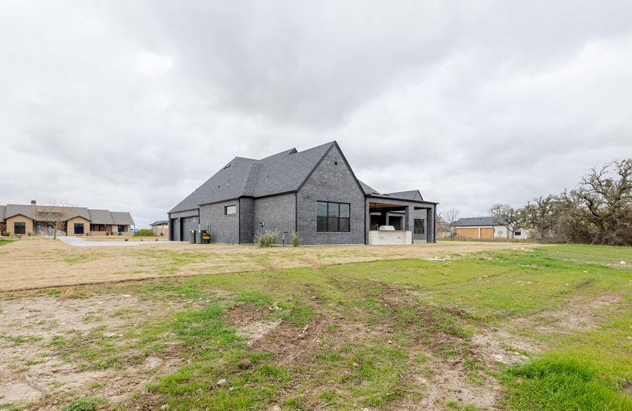 Exterior details and patio area of a home in Summit Ranch, Aledo (Image 37). Exterior details and patio area of a home in Summit Ranch, Aledo (Image 37).