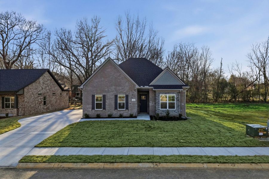 Front exterior of a new home in Sagewood, Tullahoma, TN, highlighting curb appeal (Image 23).