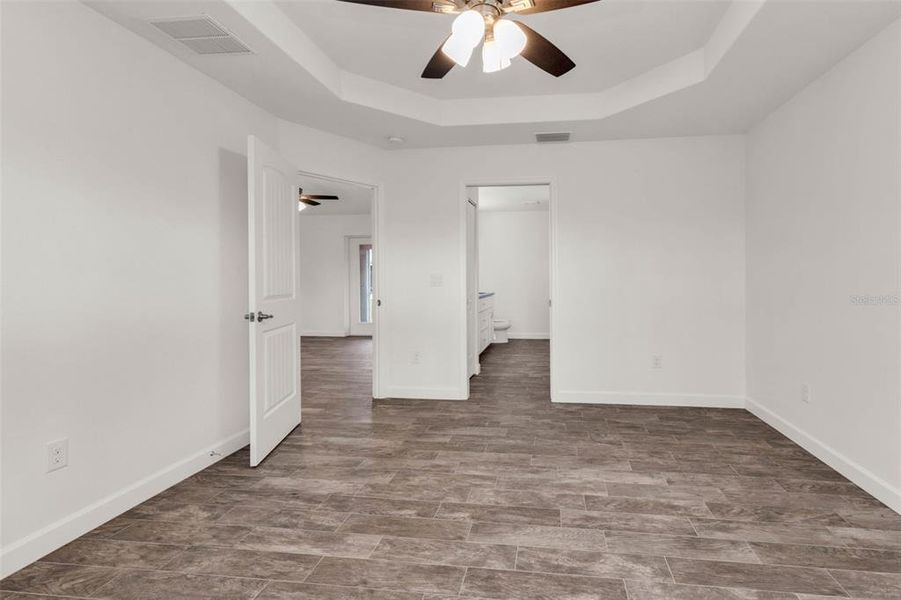 Spacious, unfurnished interior of a new home in , Port Charlotte (Image 27).