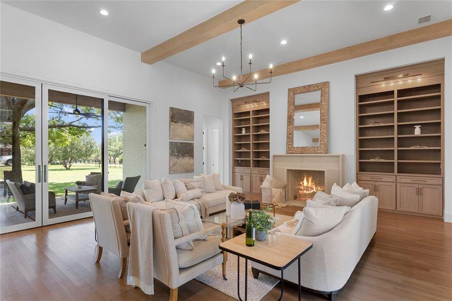 Living room. The mature backyard tree is showcased through a largel sliding panel door.