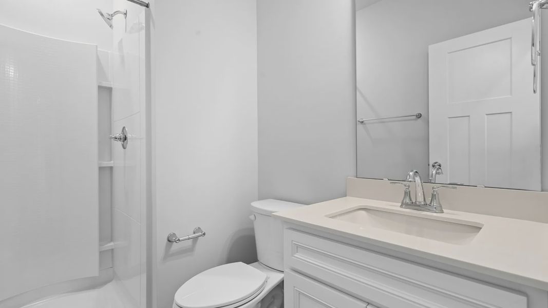 2 story single family home, all white, bathroom