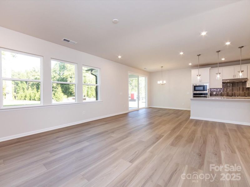 Connected spaces across the first floor to open up the home.