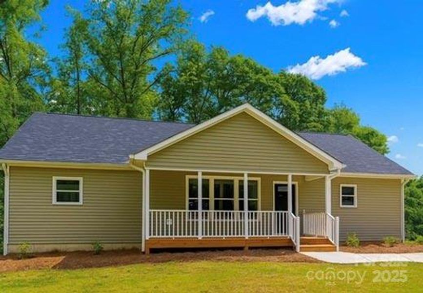 Front exterior of a new home in , Rutherfordton, NC, highlighting curb appeal (Image 1).