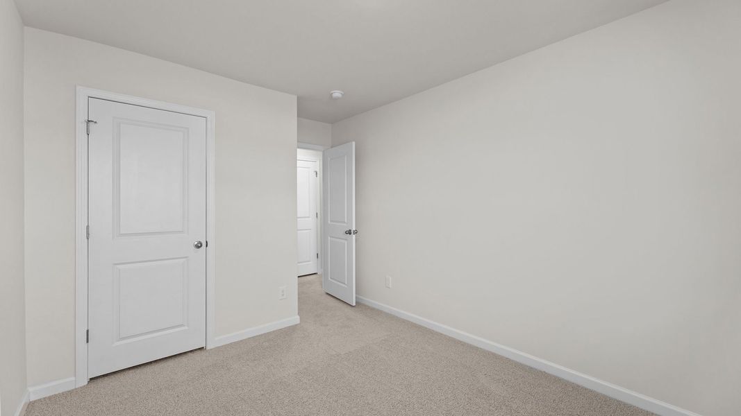 Spacious, unfurnished interior of a new home in The Townes at Ridgewood Farms, Winterville (Image 18).