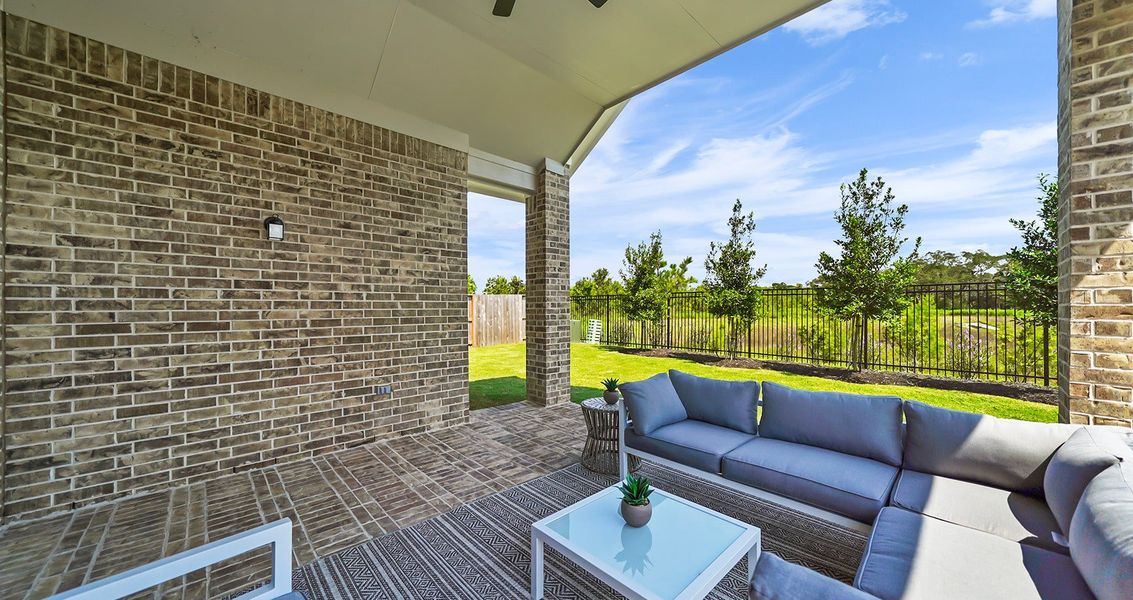 Exterior details and patio area of a home in The Trails, New Caney (Image 27).