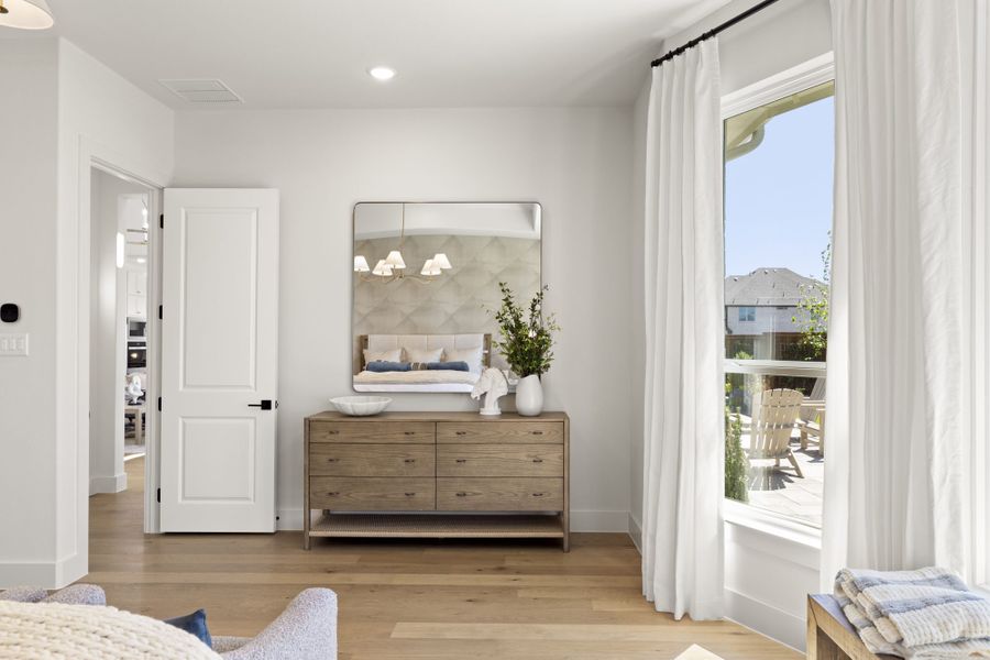 Representative furnished interior of a home built from the 6051 by Tradition Homes in StarView, Prosper (Image 34).