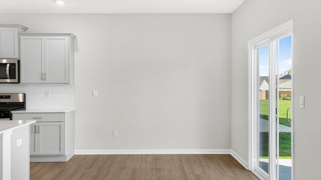 Spacious, unfurnished interior of a new home in Durbin Meadows Traditions, Fountain Inn (Image 19).