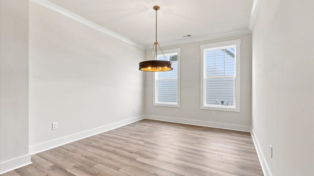 Functional and stylish dining room in our highly sought-after Wells Crossing community