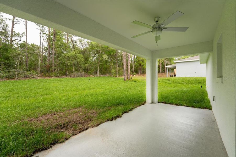 Exterior details and patio area of a home in , Citrus Springs (Image 24).
