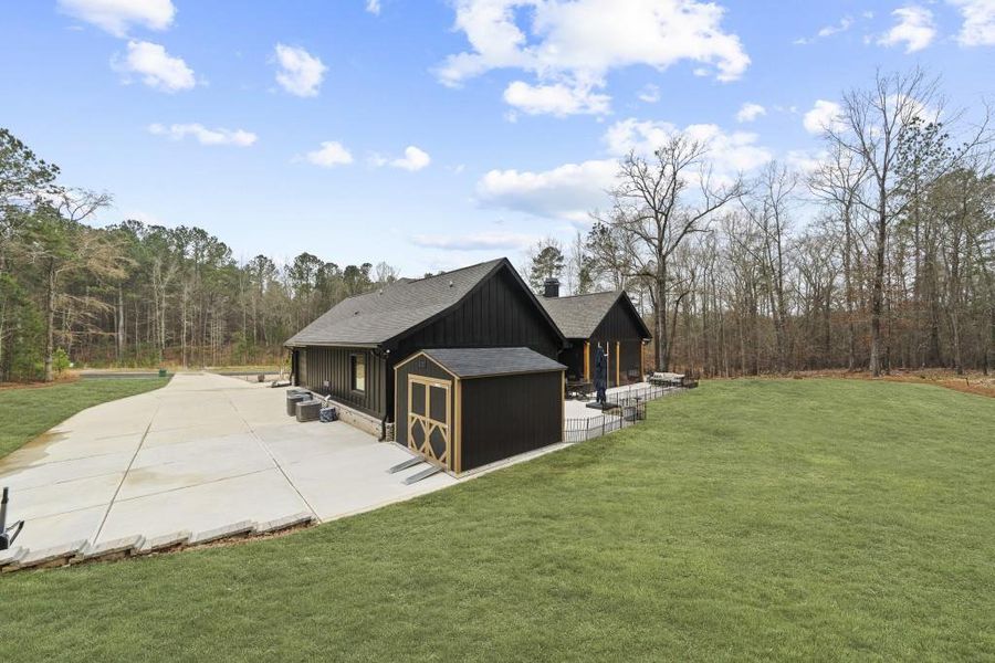 Front exterior of a new home in , Buckhead, GA, highlighting curb appeal (Image 21).