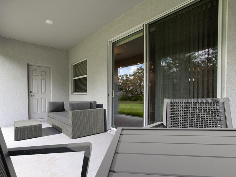 Enjoy outdoor living on your spacious covered lanai - Willow II by Highland Homes