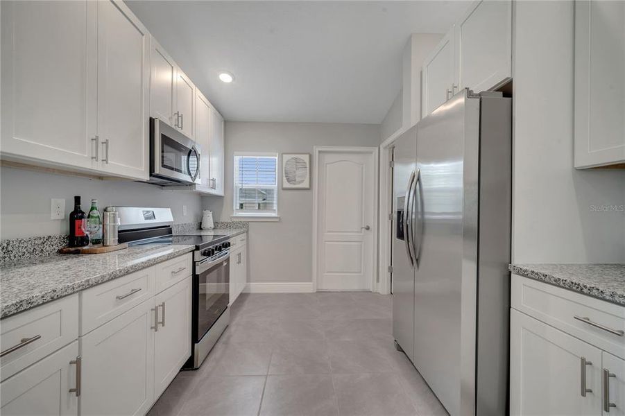 Furnished interior view inside a new home in , Kissimmee (Image 38).