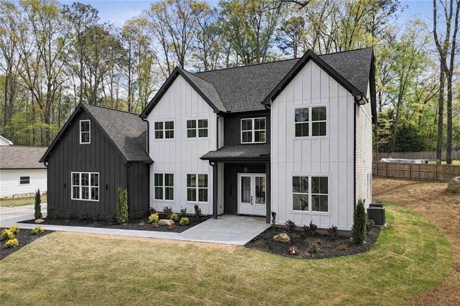 Front exterior of a new home in , Marietta, GA, highlighting curb appeal (Image 27).