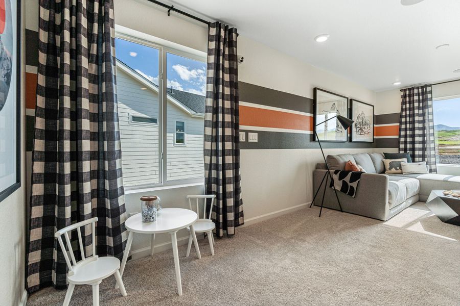 Furnished interior view inside a new home in Trailstone, Arvada (Image 19).
