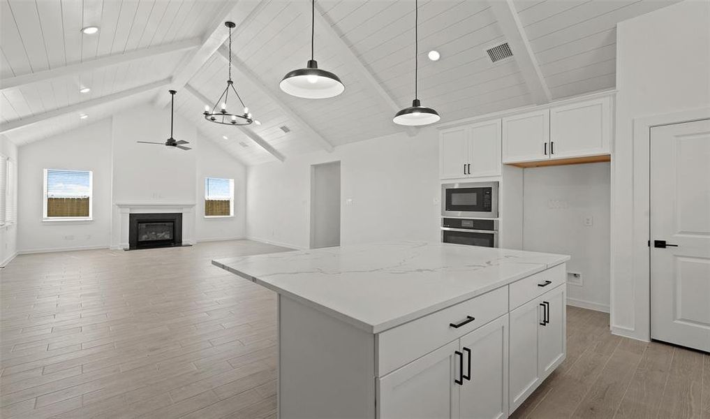 Kitchen overlooks dining area