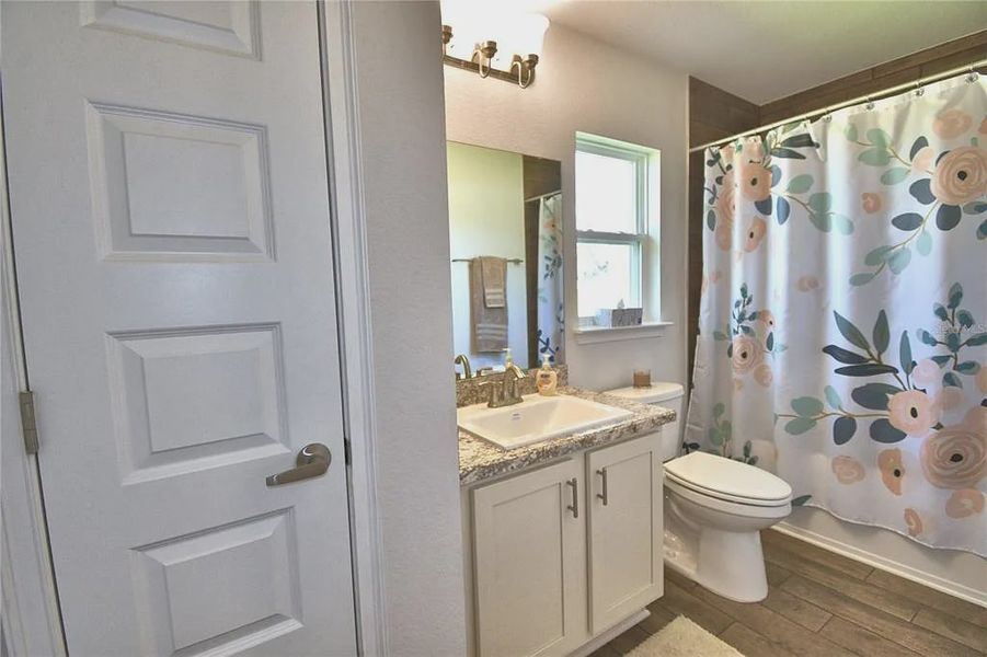 Furnished interior view inside a new home in Magnolia Park, Haines City (Image 26).