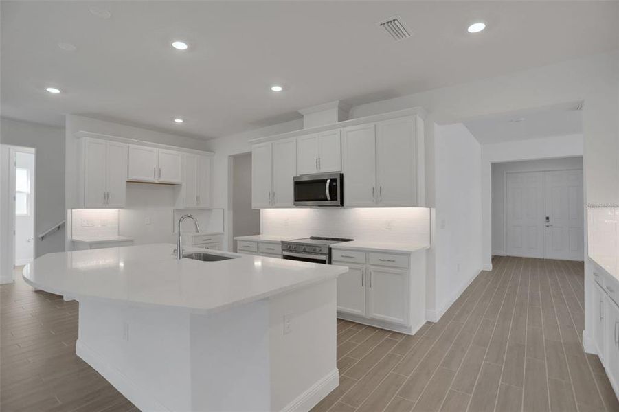 Furnished interior view inside a new home in Seaire, Parrish (Image 8).