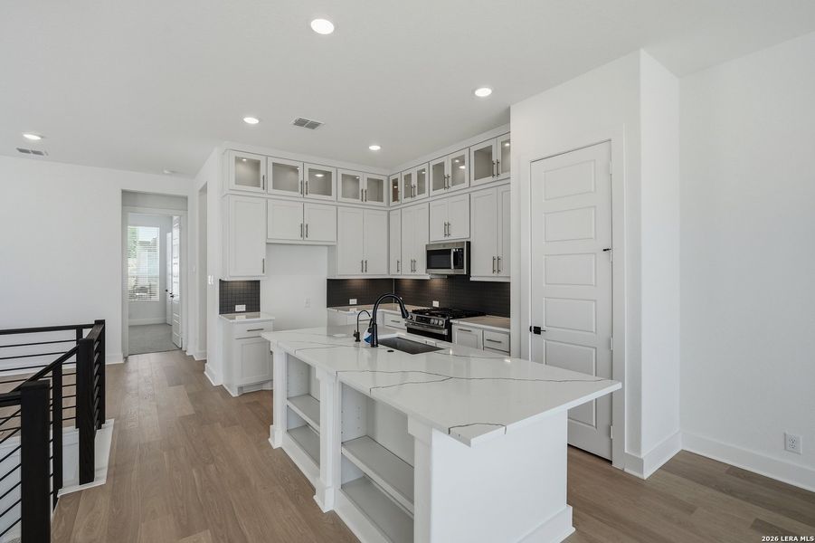 Furnished interior view inside a new home in Centero at Stone Oak, San Antonio (Image 6). Furnished interior view inside a new home in Centero at Stone Oak, San Antonio (Image 6).
