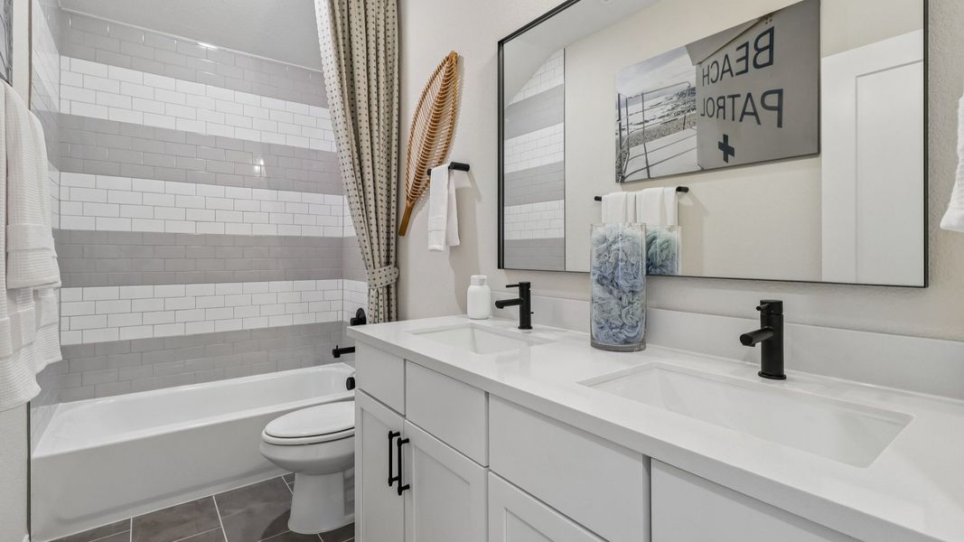 Representative furnished interior of a home built from the Rosewood by DRB Homes in Revelry, Del Valle (Image 8).