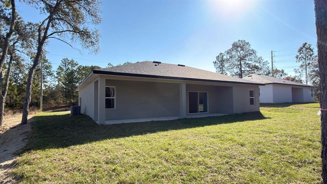 Exterior details and patio area of a home in , Citrus Springs (Image 21).