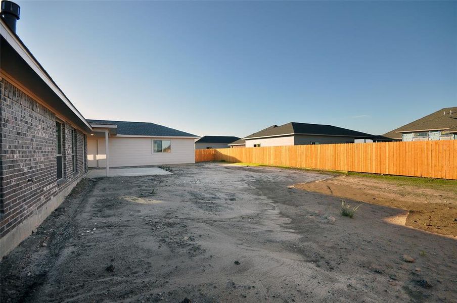 A corner lot offers privacy to the house side.