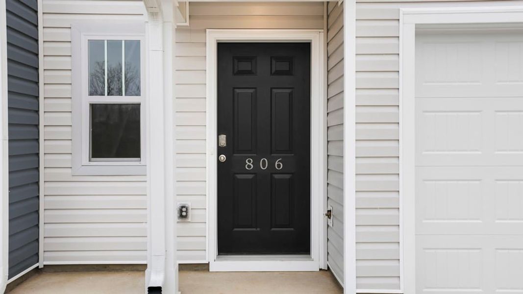 Exterior details and patio area of a home in Covington Village, Greer (Image 4).