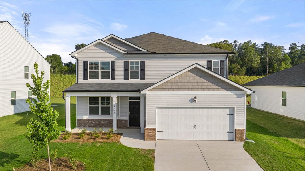 Front exterior of a new home in Captain's Corner, Grovetown, GA, highlighting curb appeal (Image 1).