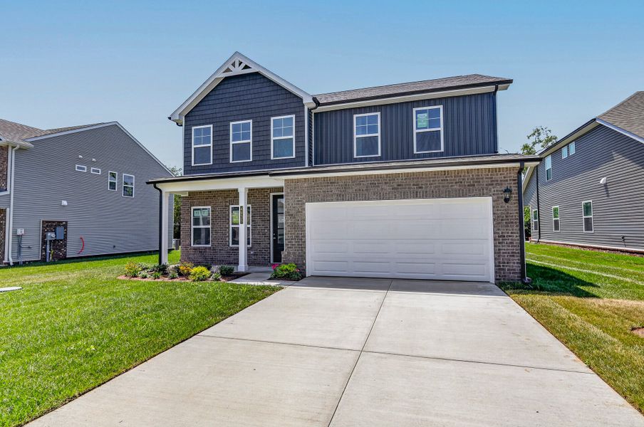 Front exterior of a new home in Smith Farms, Murfreesboro, TN, highlighting curb appeal (Image 22).
