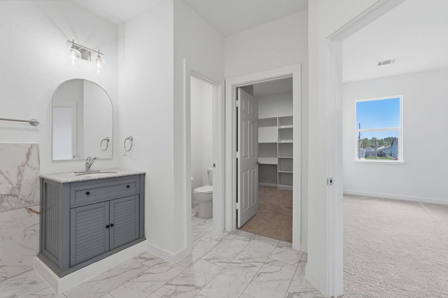 Furnished interior view inside a new home in , Conroe (Image 12).
