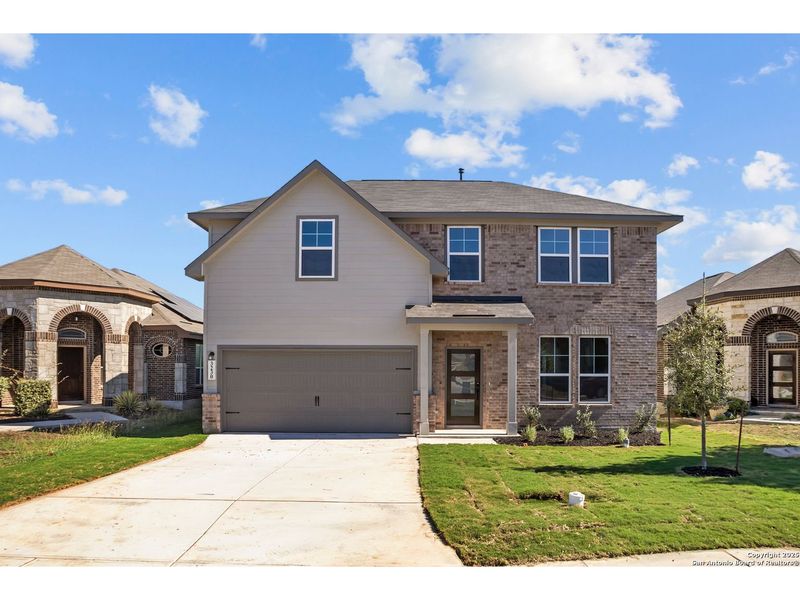 Front exterior of a new home in Horizon Pointe, Converse, TX, highlighting curb appeal (Image 1). Front exterior of a new home in Horizon Pointe, Converse, TX, highlighting curb appeal (Image 1).