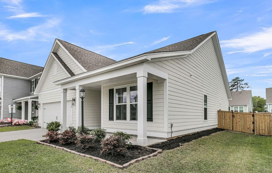 Front exterior of a new home in High Point at Foxbank, Moncks Corner, SC, highlighting curb appeal (Image 28).