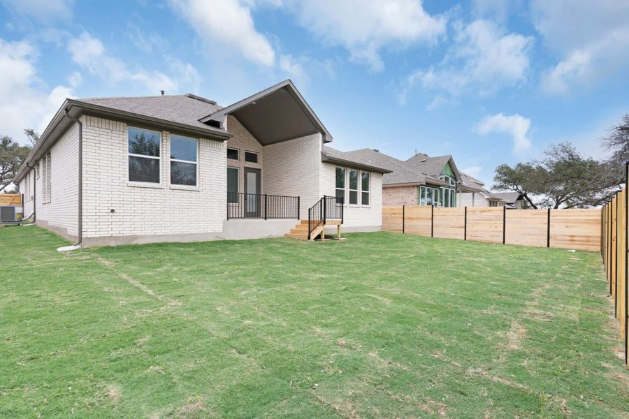Exterior details and patio area of a home in Highland Village, Georgetown (Image 3).