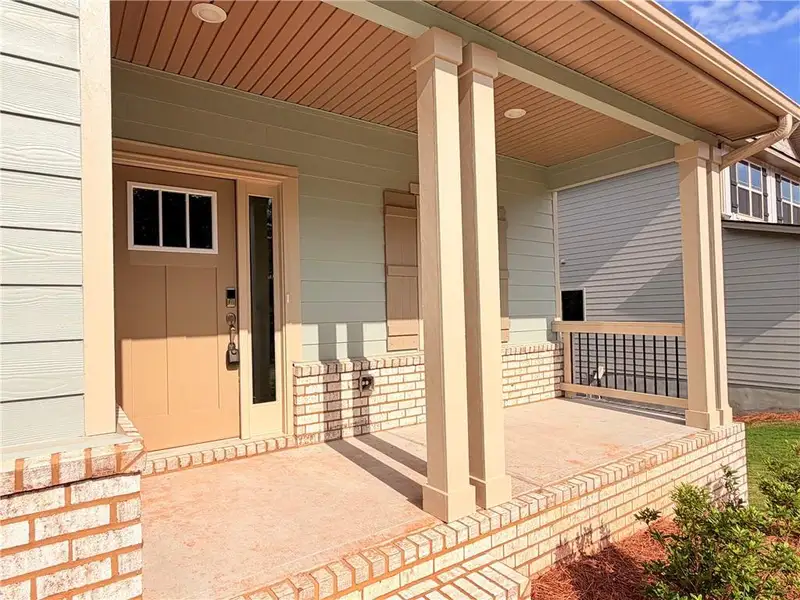Exterior details and patio area of a home in Magnolia Villas, Cornelia (Image 3).