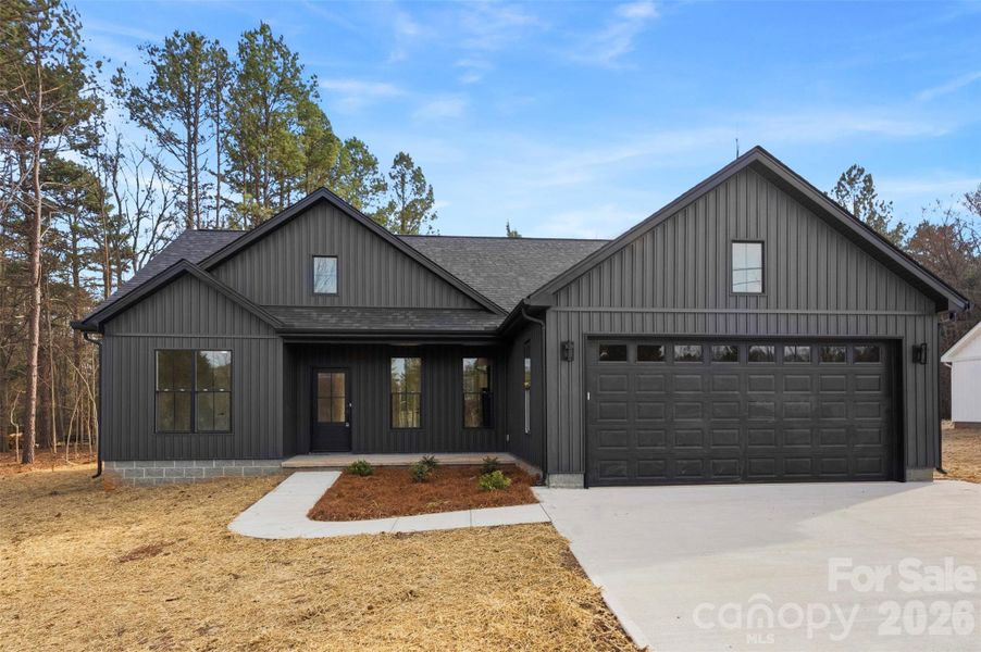 Front exterior of a new home in , China Grove, NC, highlighting curb appeal (Image 21).
