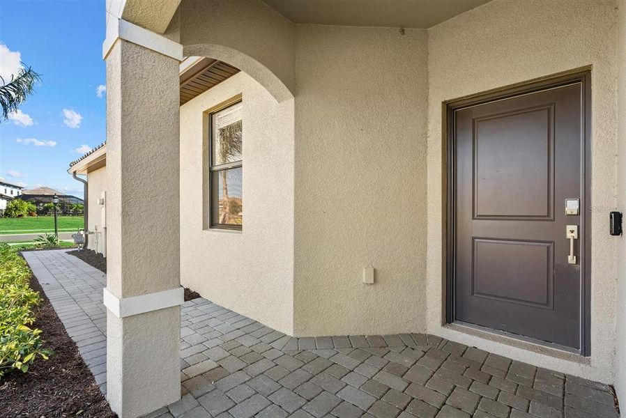Exterior details and patio area of a home in Lorraine Lakes at Lakewood Ranch, Lakewood Ranch (Image 3).